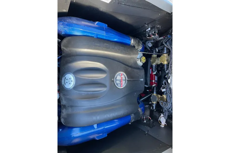 Slide: The Image of 2023 MasterCraft XStar S engine with Ilmor branding and blue components. - 13