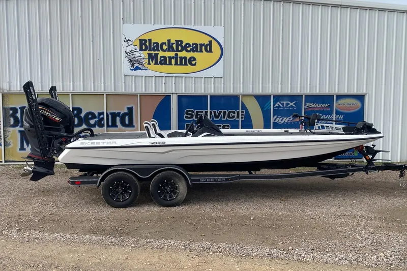 The Image of 2026 Skeeter ZXE21 boat on trailer at BlackBeard Marine dealership. - 1