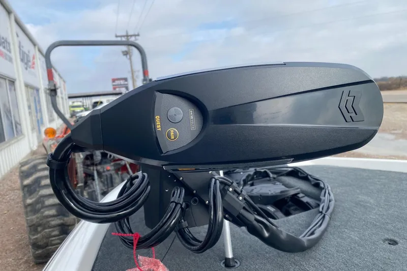 Slide: The Image of Close-up of 2026 Skeeter ZXE21 boat motor with control panel and cables. - 10