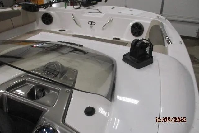 Slide: The Image of 2025 Tahoe 1950 boat interior with speakers and control panel. - 1