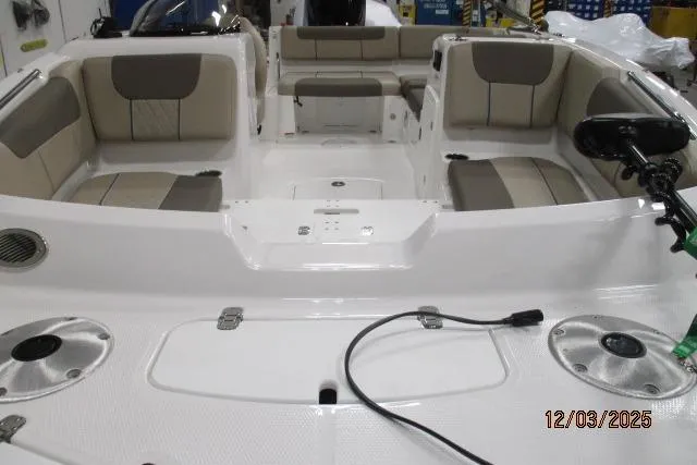 Slide: The Image of 2025 Tahoe 1950 boat interior with beige seating and modern design. - 4