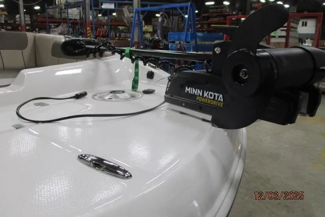 Slide: The Image of Minn Kota PowerDrive motor on 2025 Tahoe 1950 boat, indoor setting, dated 12/03/2025. - 5
