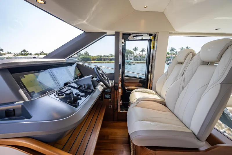 Slide: The Image of Luxurious interior of 2023 Princess Y72 yacht with modern helm and plush seating. - 22