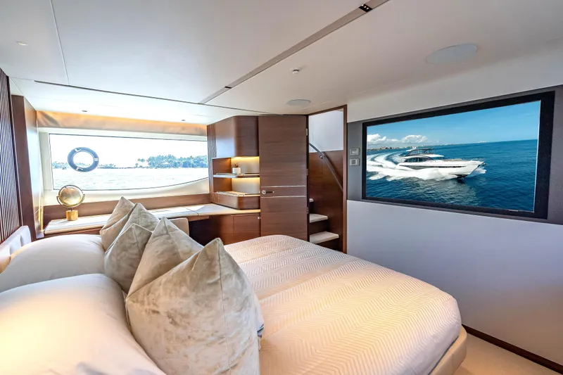 Slide: The Image of Luxurious interior of 2023 Princess Y72 yacht with elegant bedroom and ocean view. - 26