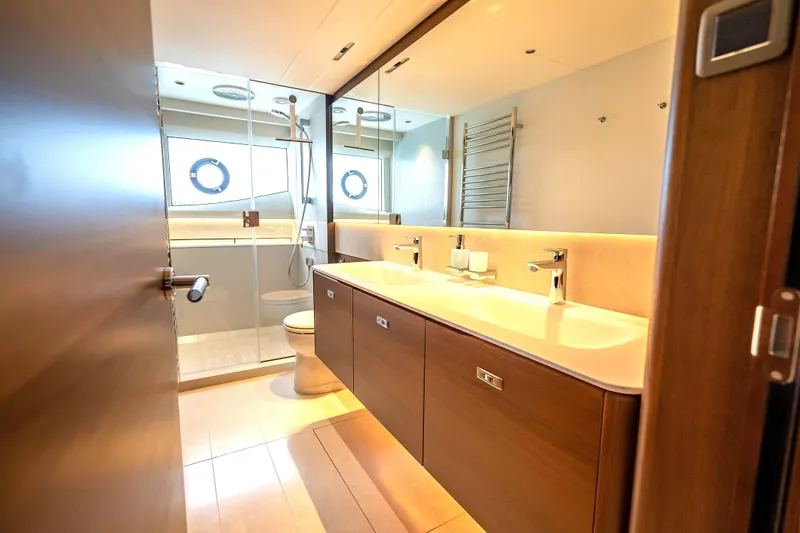 Slide: The Image of Luxurious bathroom in 2023 Princess Y72 yacht with dual sinks and modern fixtures. - 28
