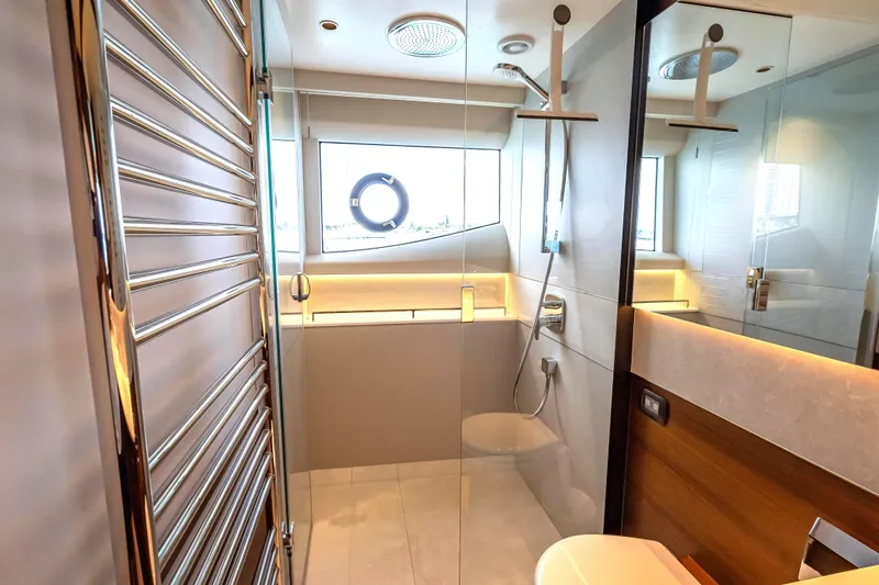 Slide: The Image of Luxurious bathroom interior of 2023 Princess Y72 yacht with modern fixtures and elegant design. - 29