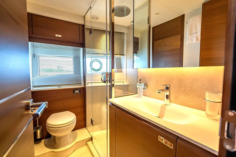 Slide: The Image of Luxurious bathroom in 2023 Princess Y72 yacht with modern fixtures and elegant design. - 34