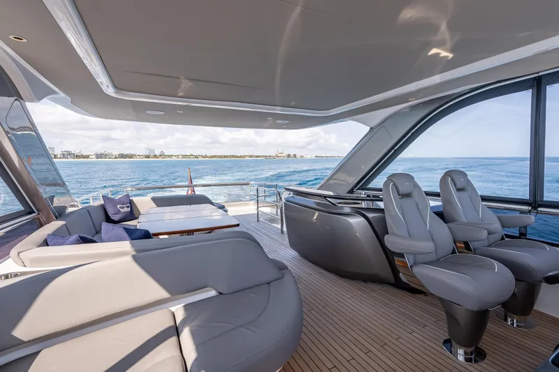 Slide: The Image of Luxurious 2023 Princess Y72 yacht interior with elegant seating and ocean view. - 42