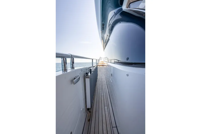 Slide: The Image of Side view of 2023 Princess Y72 yacht with sleek design and wooden deck. - 44