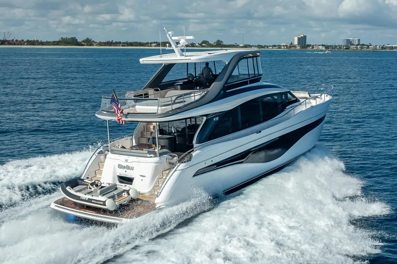 Slide: The Image of Luxury 2023 Princess Y72 yacht cruising on open water, showcasing sleek design and elegance. - 5