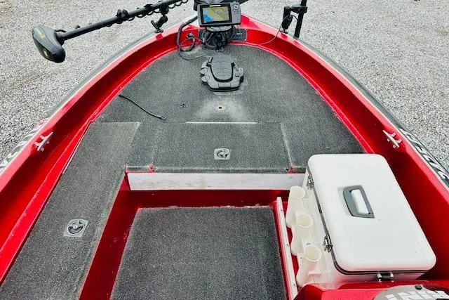 Slide: The Image of Red 1997 Sprint 267 boat interior with fishing equipment and storage compartments. - 14