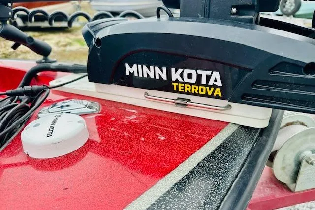 Slide: The Image of Minn Kota Terrova motor on red Sprint 267 boat, 1997 model. - 8