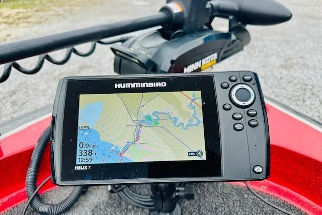 Slide: The Image of Fishfinder on 1997 Sprint 267 boat, displaying navigation map and speed data. - 9