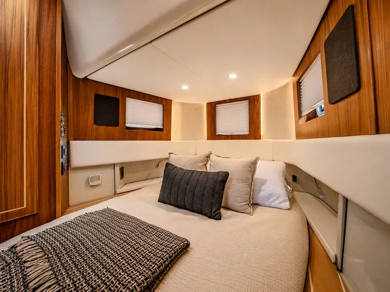 Slide: The Image of Luxurious cabin with wood paneling and cozy bed in the HCB 56 GIX 2027. - 20