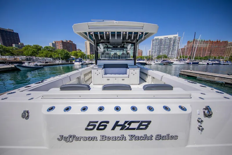 Slide: The Image of 2027 HCB 56 GIX in a marina, featuring modern amenities and luxurious design. - 3