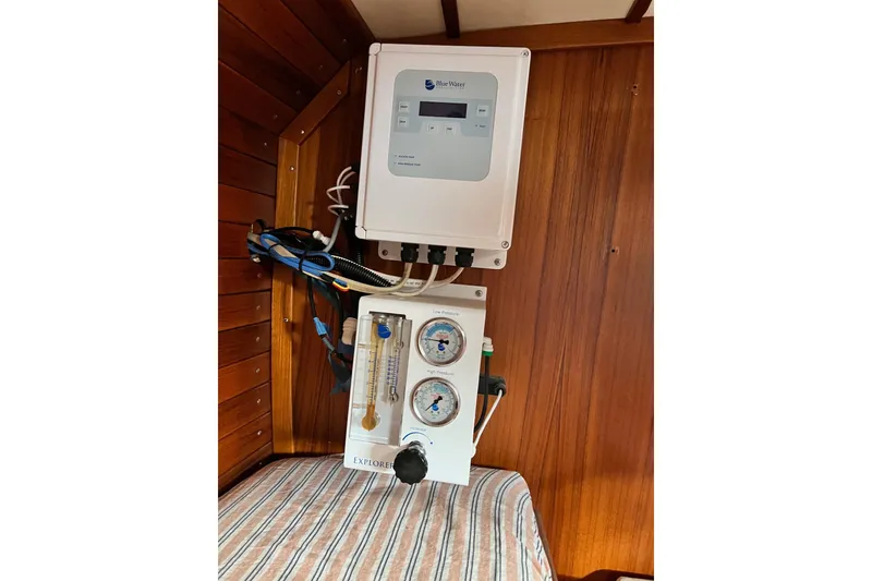 Slide: The Image of Control panel and gauges on 1985 Robert Clark Ketch boat interior. - 33