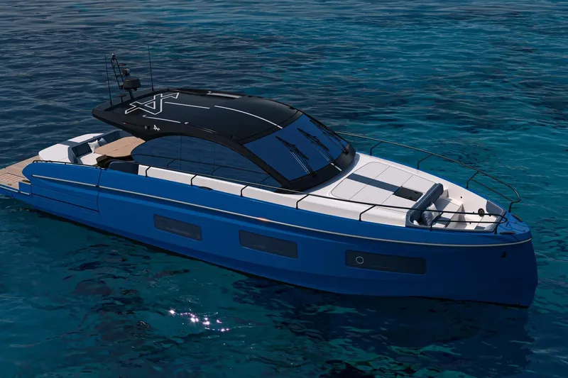 Slide: The Image of 2026 Beneteau Gran Turismo 50 yacht on clear blue water, sleek design, luxury features. - 3