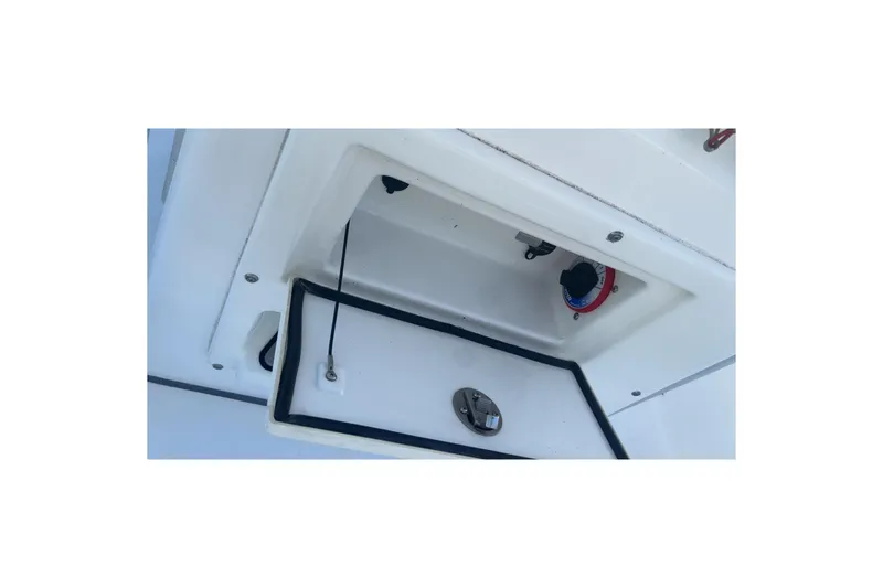 Slide: The Image of 2019 Sea Fox 200 Viper boat compartment with open hatch and visible wiring. - 20