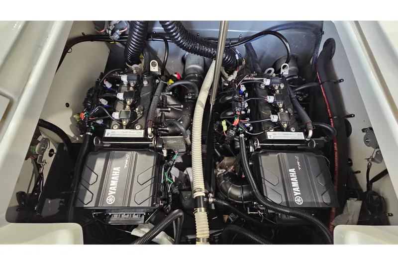 Slide: The Image of Yamaha 210 FSH Sport 2021 engine compartment with dual engines. - 18