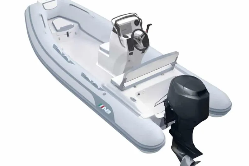 Slide: The Image of 2024 AB Inflatables Oceanus 14 VST boat with outboard motor, white and gray design. - 1