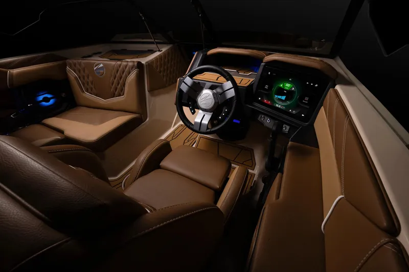 Slide: The Image of Manufacturer Provided Image: Luxurious interior of 2026 Tigé 22RZX boat with modern dashboard and leather seating. - 6