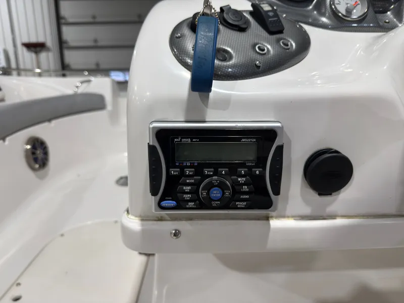 Slide: The Image of Control console of a 2014 Starcraft 2000 Limited boat. - 13