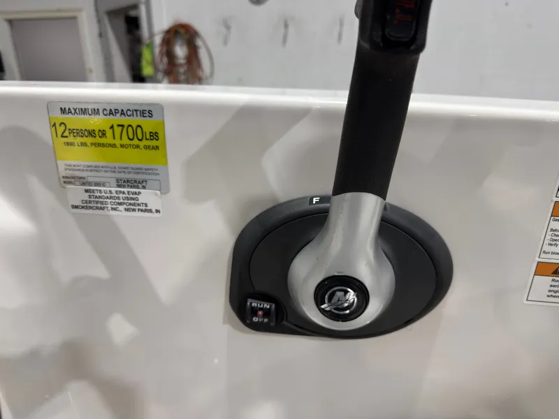 Slide: The Image of Starcraft 2000 Limited 2014 boat control with capacity label. - 16