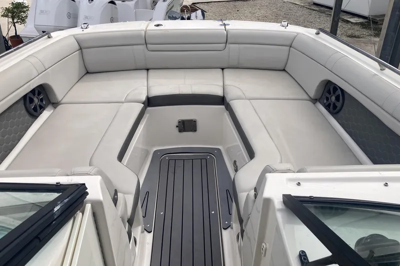 Slide: The Image of 2020 Sea Ray SDX 270 Outboard boat interior with spacious seating and modern design. - 14