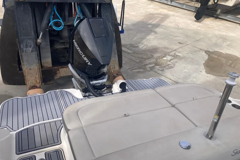 Slide: The Image of 2020 Sea Ray SDX 270 Outboard with Mercury engine on a dock. - 30