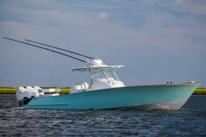 Slide: The Image of Open storage compartments on a 2018 Tribute 37 boat deck. - 4