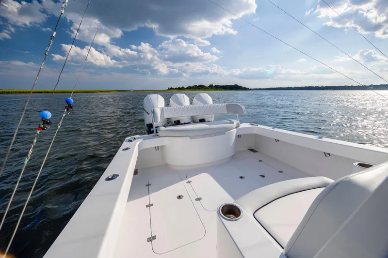 Slide: The Image of Luxurious 2018 Tribute 37 boat bathroom with wooden sink and modern fixtures. - 6