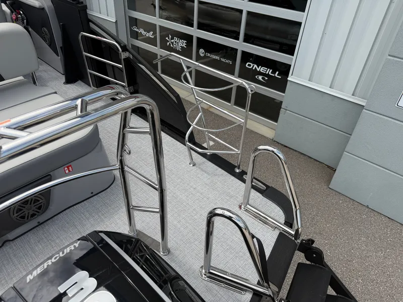 Slide: The Image of Harris Solstice DC 250 boat with stainless steel railings, year 2026. - 12
