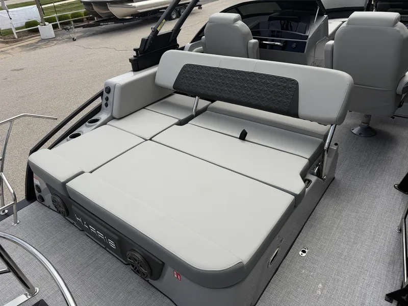 Slide: The Image of 2026 Harris Solstice DC 250 boat with luxurious seating area. - 21