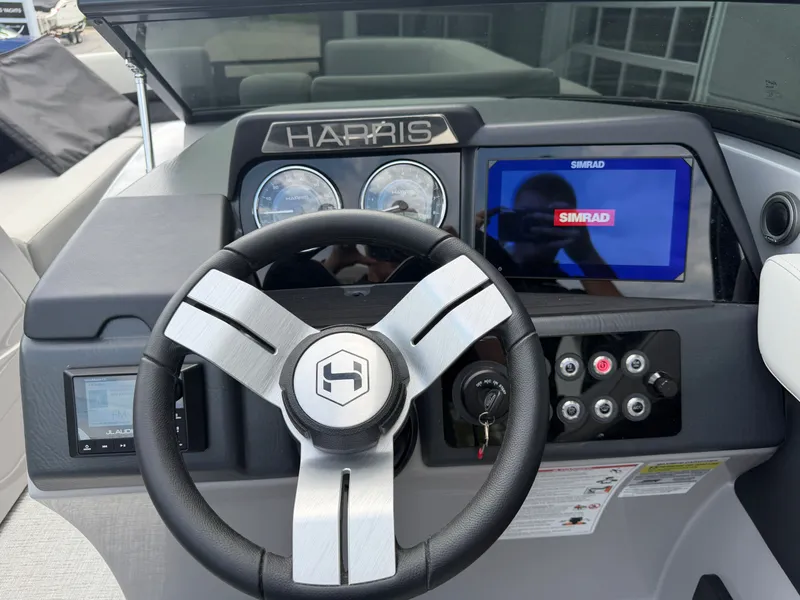 Slide: The Image of Steering console of the 2026 Harris Solstice DC 250. - 37