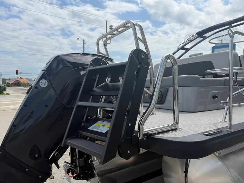 Slide: The Image of Harris Solstice DC 250 boat 2026 with motor and ladder. - 9