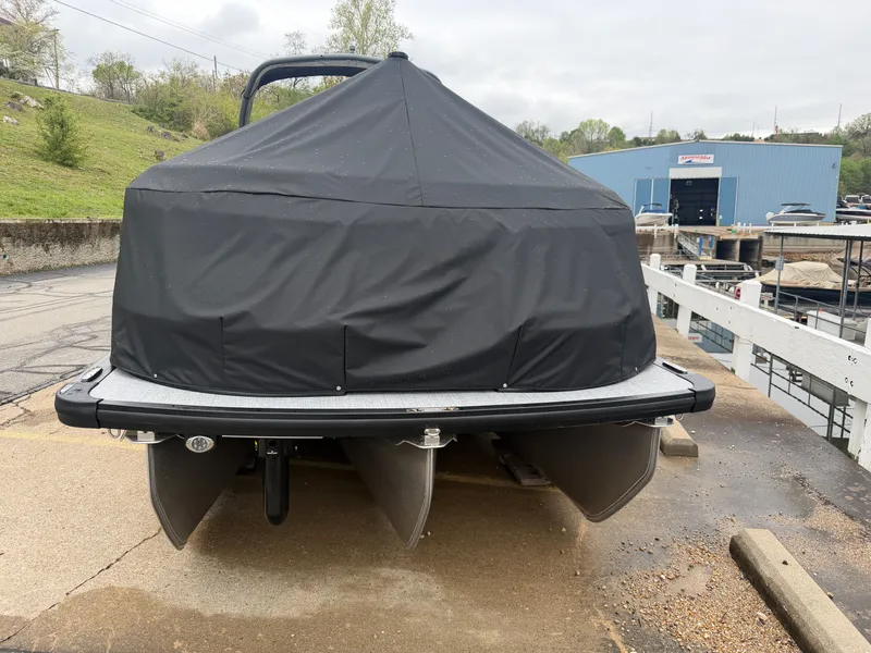 Slide: The Image of Covered Harris Grand Mariner 270 boat, model year 2026, at a dock. - 27