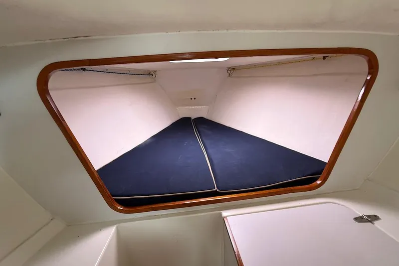 Slide: The Image of Interior cabin view of 2008 e Sailing Yachts e33, featuring a cozy sleeping area. - 19