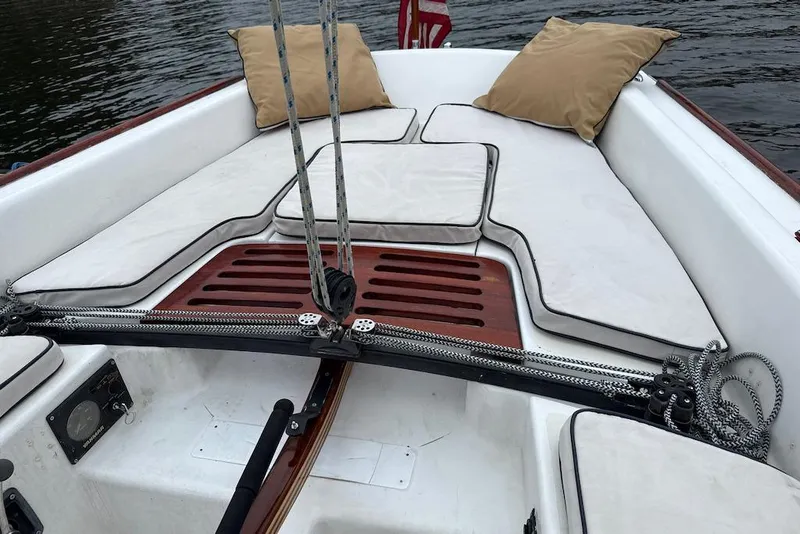 Slide: The Image of 2008 e Sailing Yachts e33 sailboat interior with cushioned seating and rigging. - 7