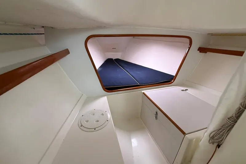 Slide: The Image of Interior cabin of 2008 e Sailing Yachts e33, featuring a cozy sleeping area. - 18