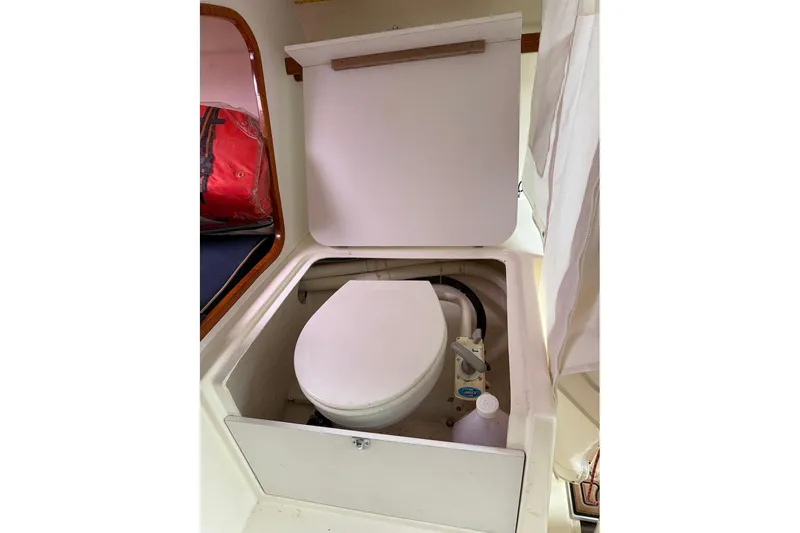 Slide: The Image of 2008 e Sailing Yachts e33 interior with compact marine toilet. - 20
