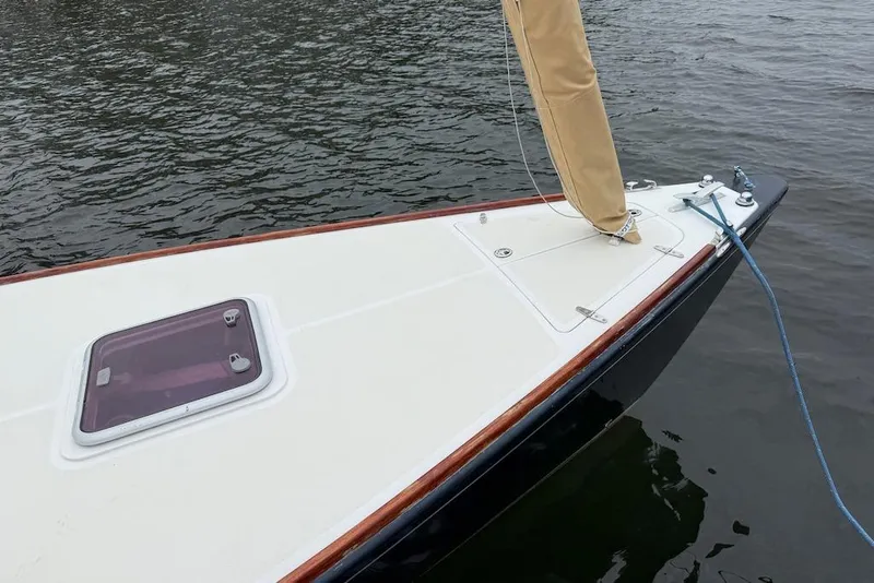 Slide: The Image of Bow of 2008 e Sailing Yachts e33 sailboat on calm water. - 3