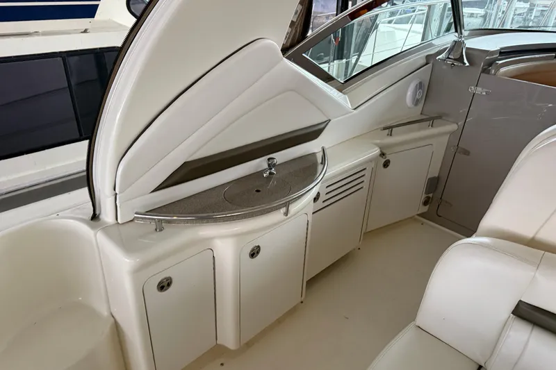 Slide: The Image of 2006 Sea Ray 40 Sundancer interior with sleek cabinetry and modern design. - 28