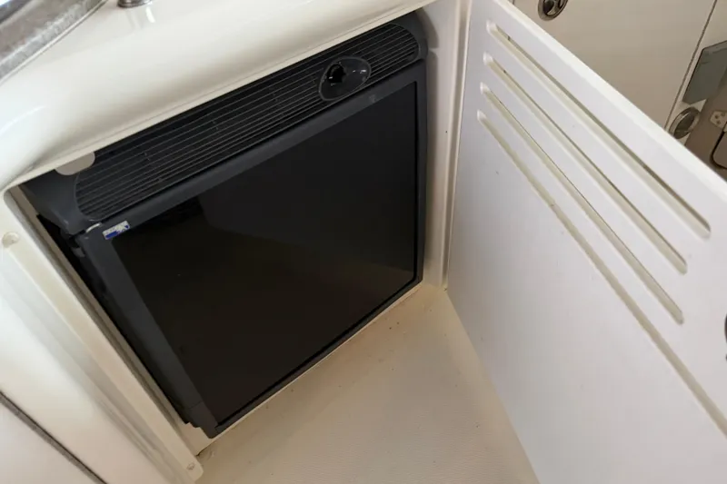 Slide: The Image of Compact refrigerator in 2006 Sea Ray 40 Sundancer yacht interior. - 31