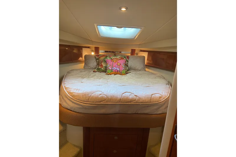 Slide: The Image of Luxurious cabin interior of 2006 Sea Ray 40 Sundancer yacht with cozy bedding. - 33