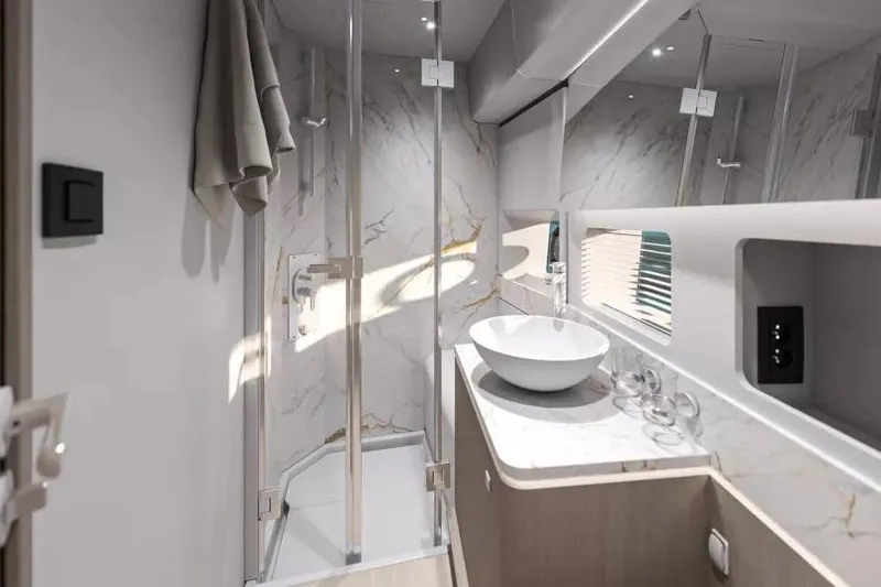 Slide: The Image of Luxurious bathroom in 2026 Beneteau Gran Turismo 50 yacht with modern fixtures and marble accents. - 10