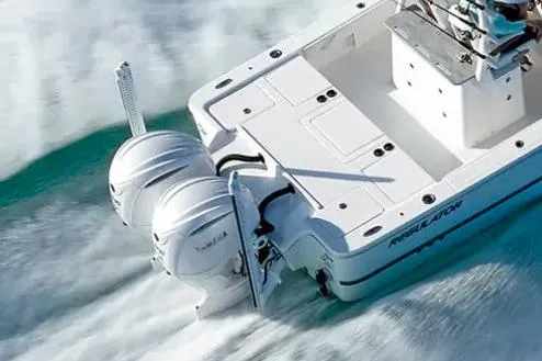 Slide: The Image of 2026 Regulator 30XO boat with dual outboard engines cruising on water. - 3