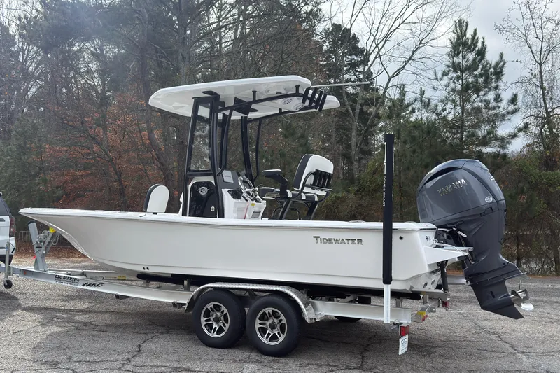 Slide: The Image of 2026 Tidewater 2210 Carolina Bay boat on trailer, parked outdoors. - 6