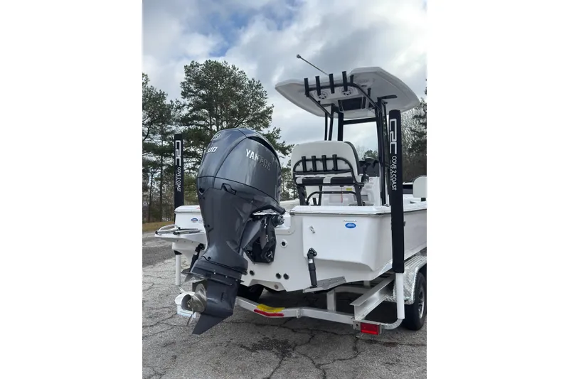 Slide: The Image of 2026 Tidewater 2210 Carolina Bay boat with Yamaha outboard motor on trailer. - 7