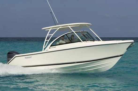 Slide: The Image of 2014 Pursuit DC 265 Dual Console interior with seating and helm details. - 34