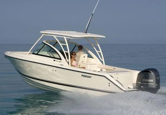 Slide: The Image of 2014 Pursuit DC 265 Dual Console boat interior with beige seating and modern design. - 35